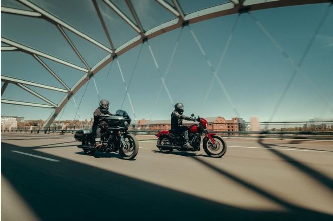 motrocycles riding over bridge